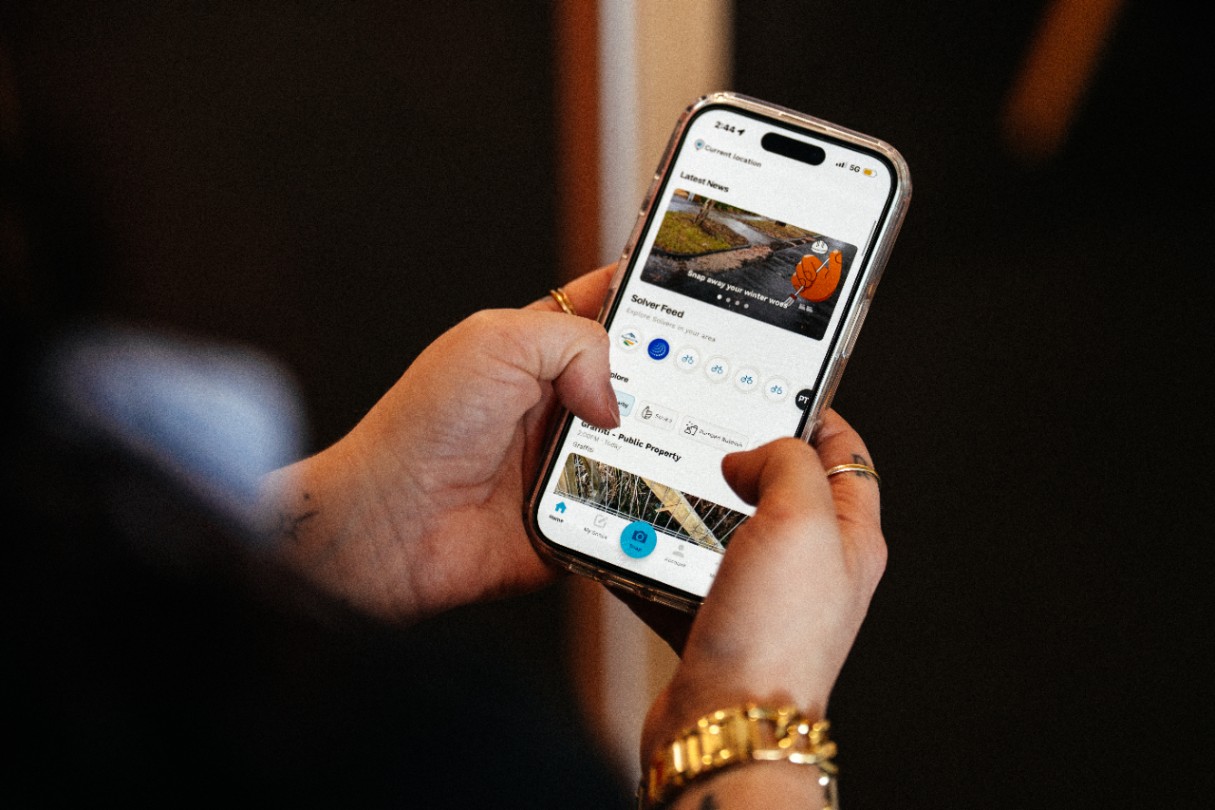 Image shows a South East Water employee using the Snap Send Solve app