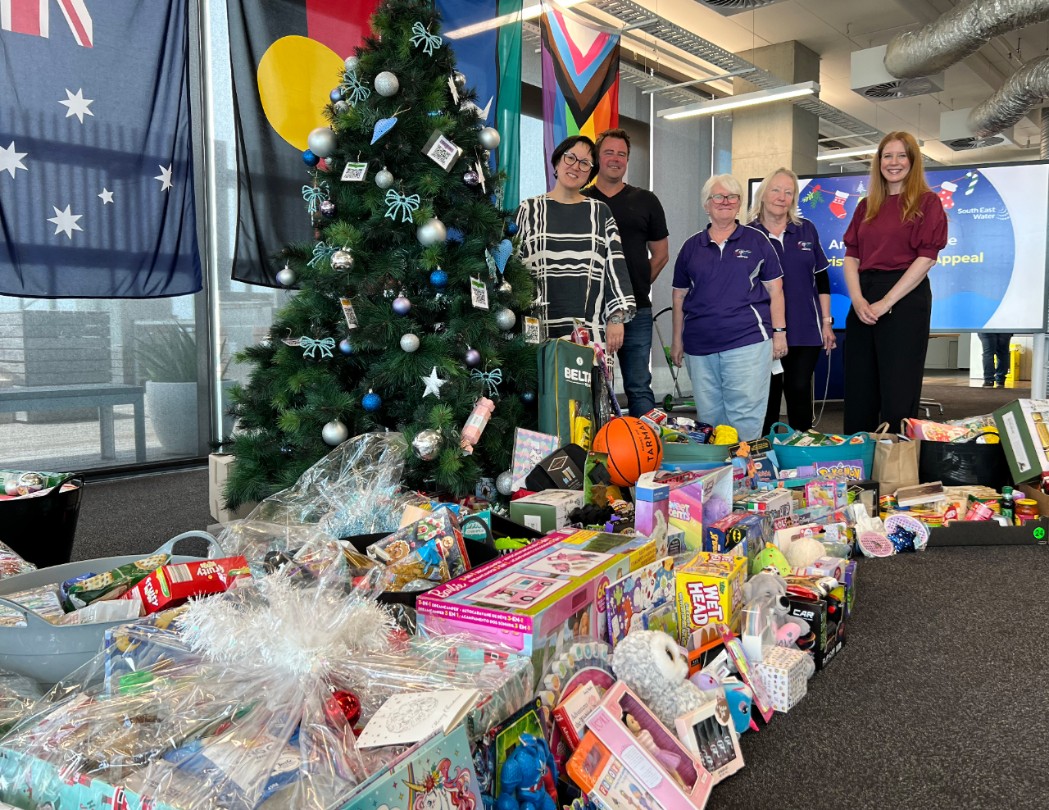 Community members in need will receive an extra helping hand this Christmas with South East Water employees raising more than $9,100 through its annual giving appeal. 